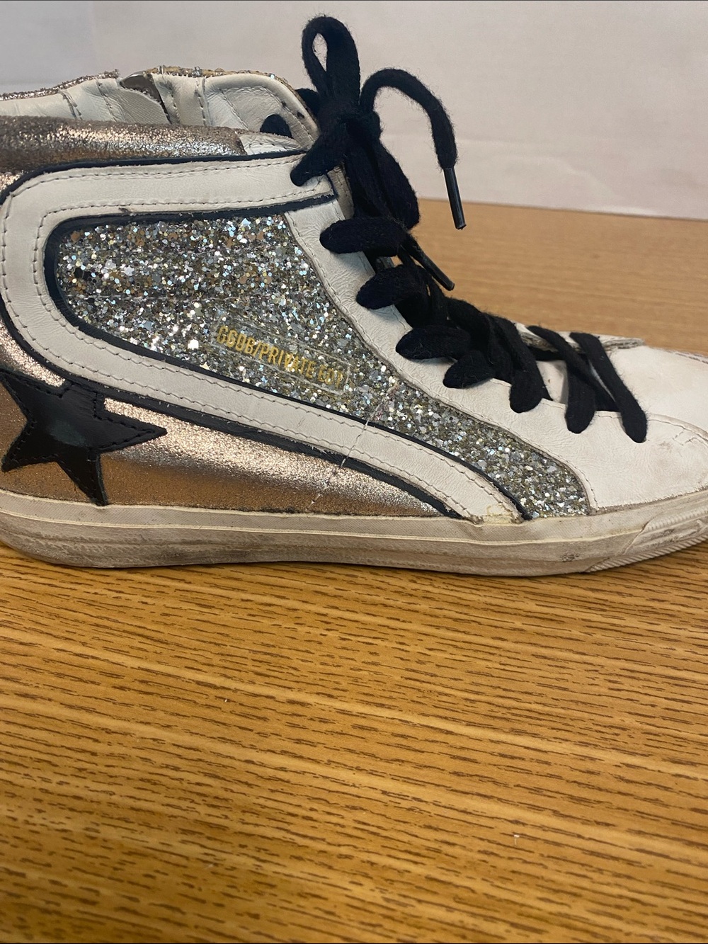 Golden Goose High-Top Sneakers in White Silver Gold with Black Star